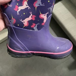 Gently used girls BOGS boots in purple.